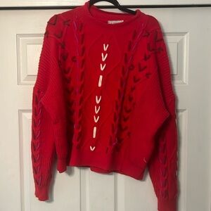 La Manche red sweater
